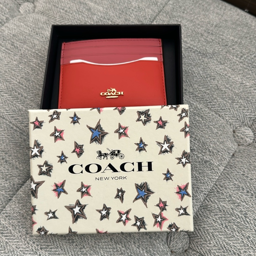 NWT(relisted)Coach leather card case in deep coral/peony color block.